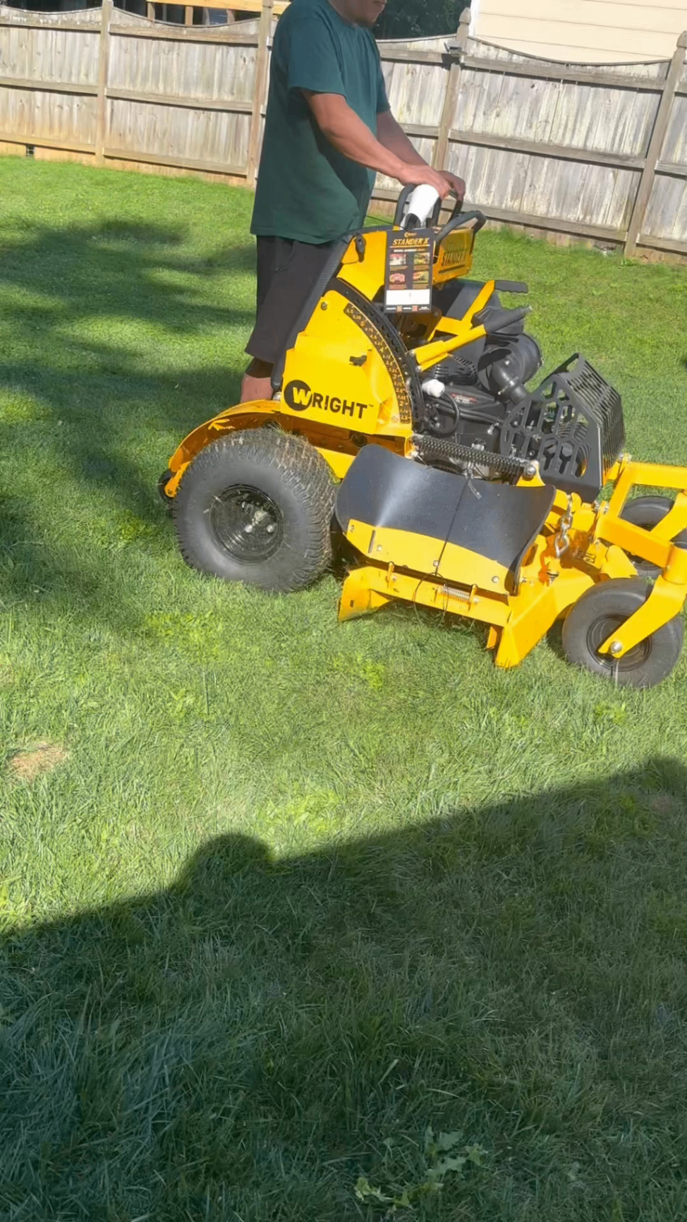 Lawn care specialist at sunrise